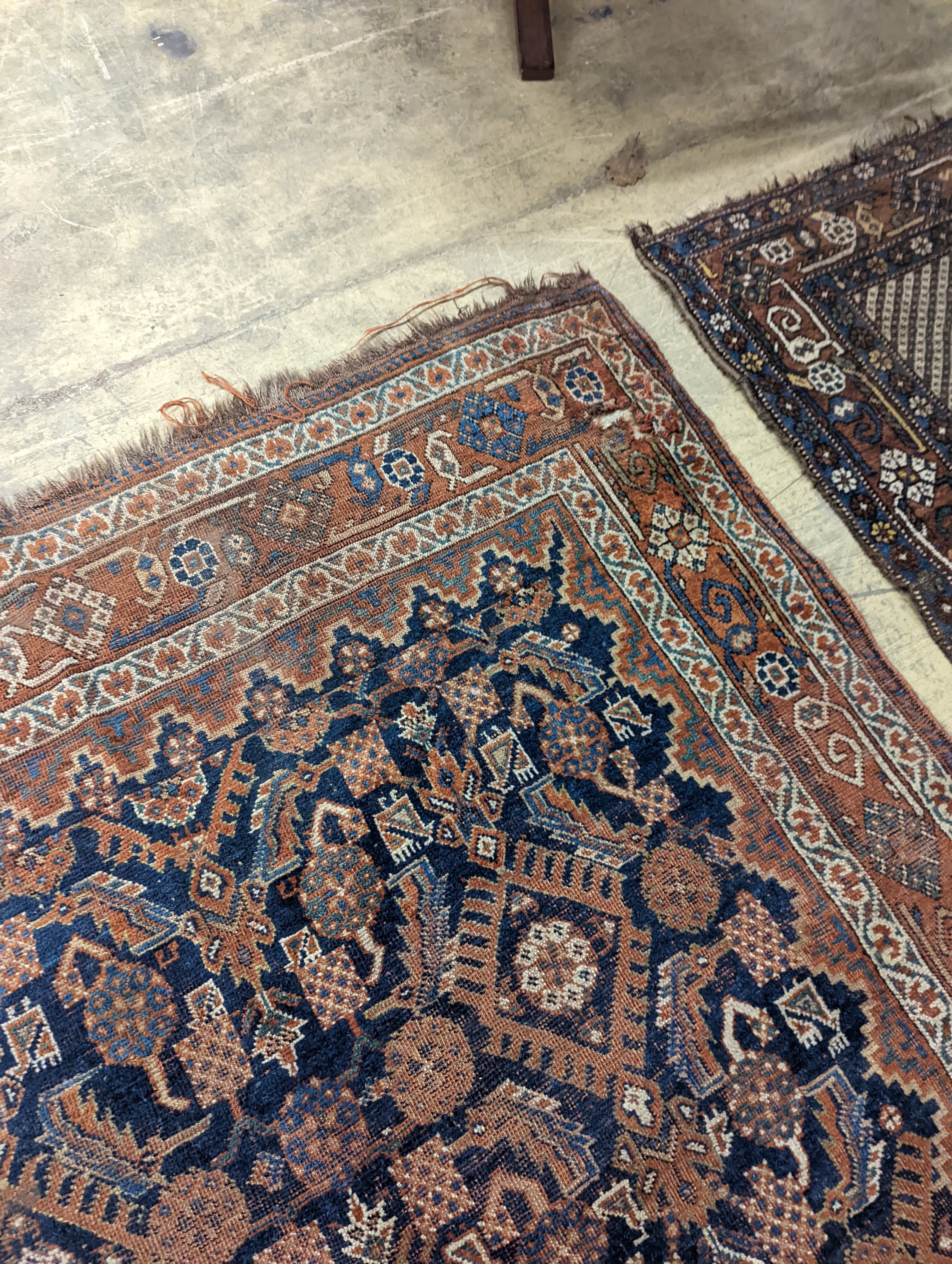 Two antique Caucasian rugs, larger 200 x 135cm